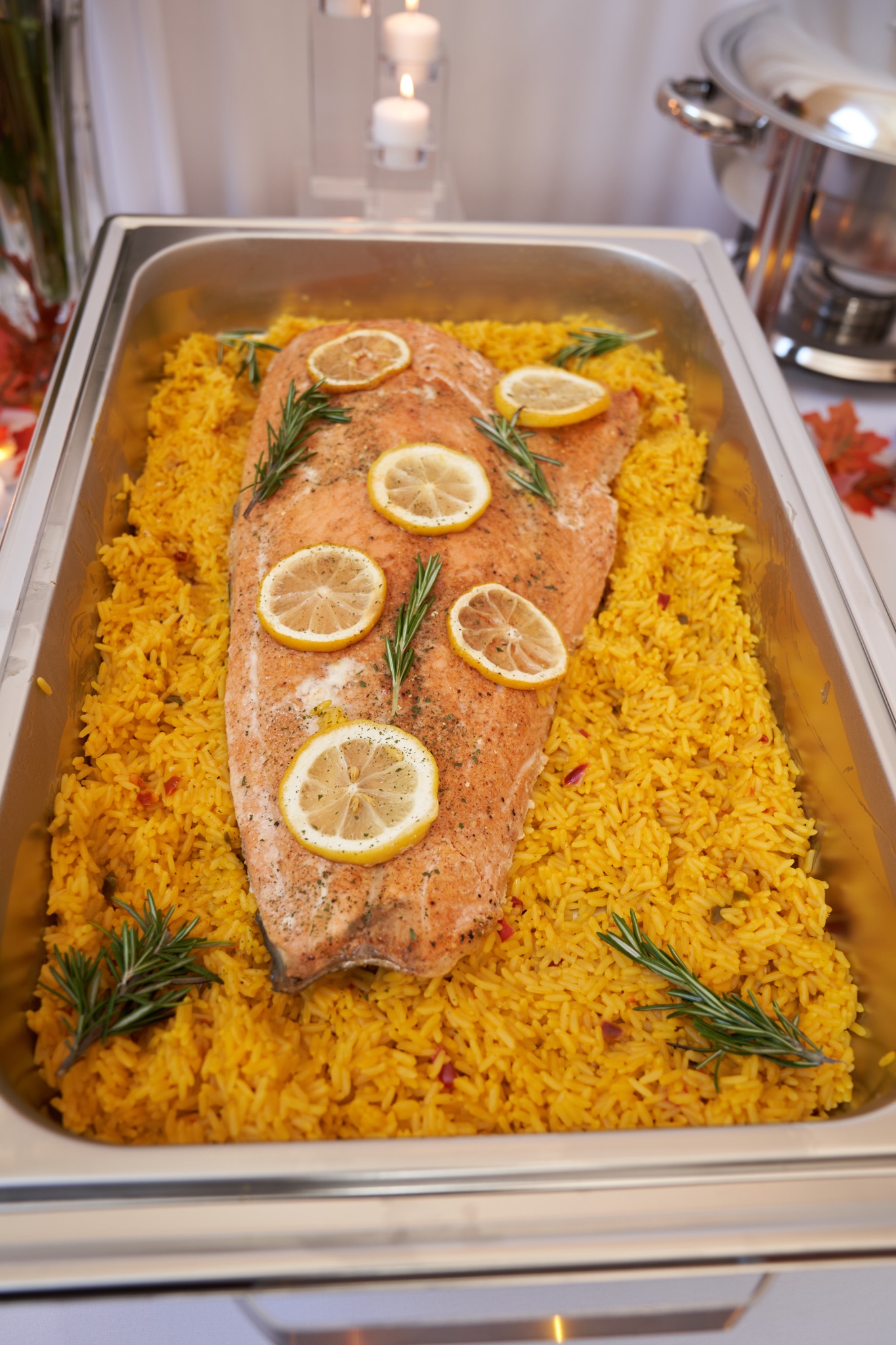 Baked Salmon baked on a bed of yellow rice